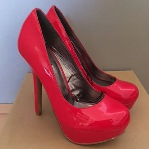 Red high heels / pumps / shoes